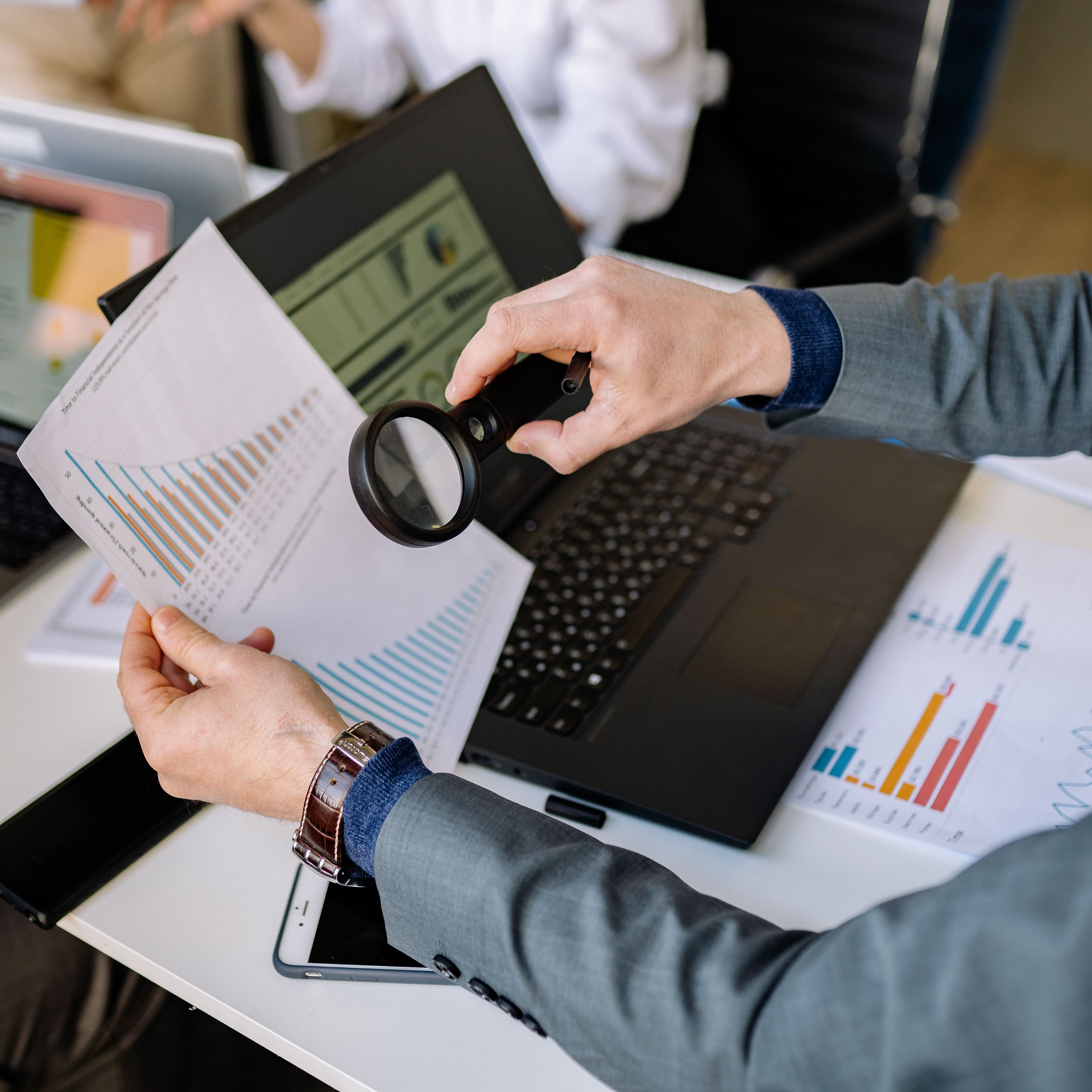 Accounting professionals reviewing financial reports